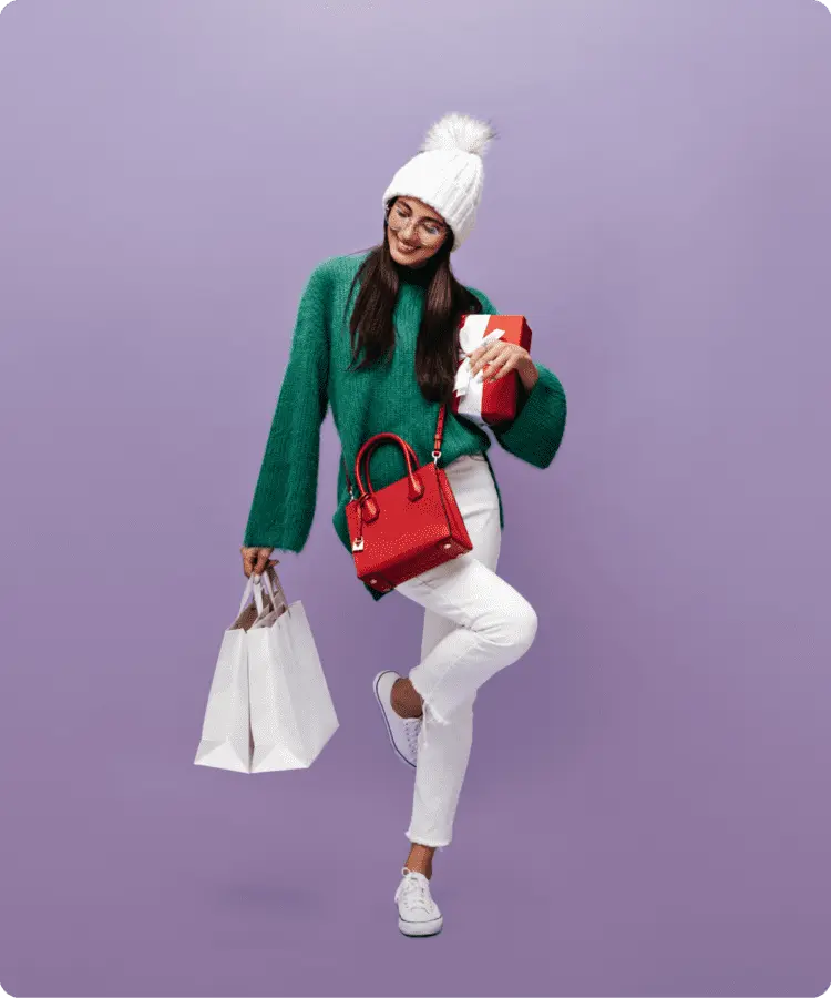 kvinde-shoppingposer-viabill Kvinde med shoppingposer og gaveæske, symbol på bekvem online shopping med ViaBill.